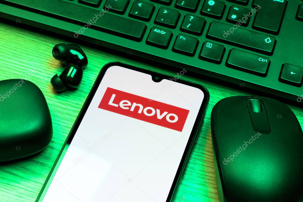 Prague, Czechia - 10 21 2024: Smartphone on surface showing Lenovo logo.
