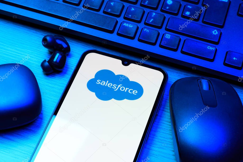 Prague, Czechia - 10 21 2024: Smartphone on surface showing Salesforce logo.