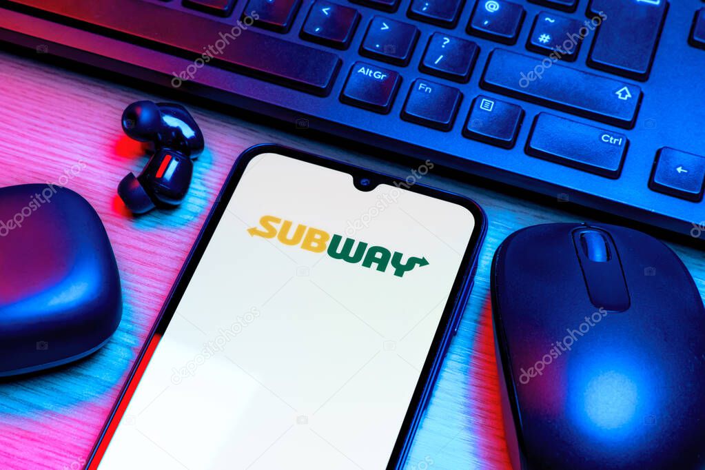 Prague, Czechia - 10 21 2024: Smartphone on surface showing Subway logo.