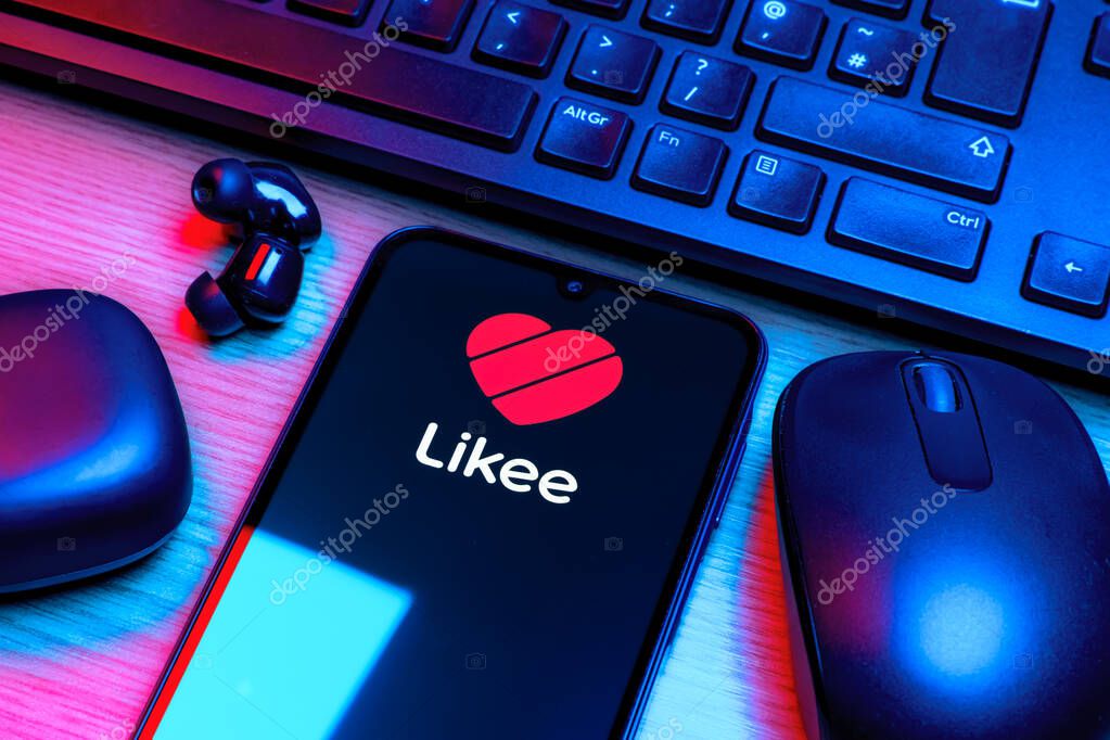 Prague, Czechia - 10 21 2024: Smartphone on surface showing Likee logo.