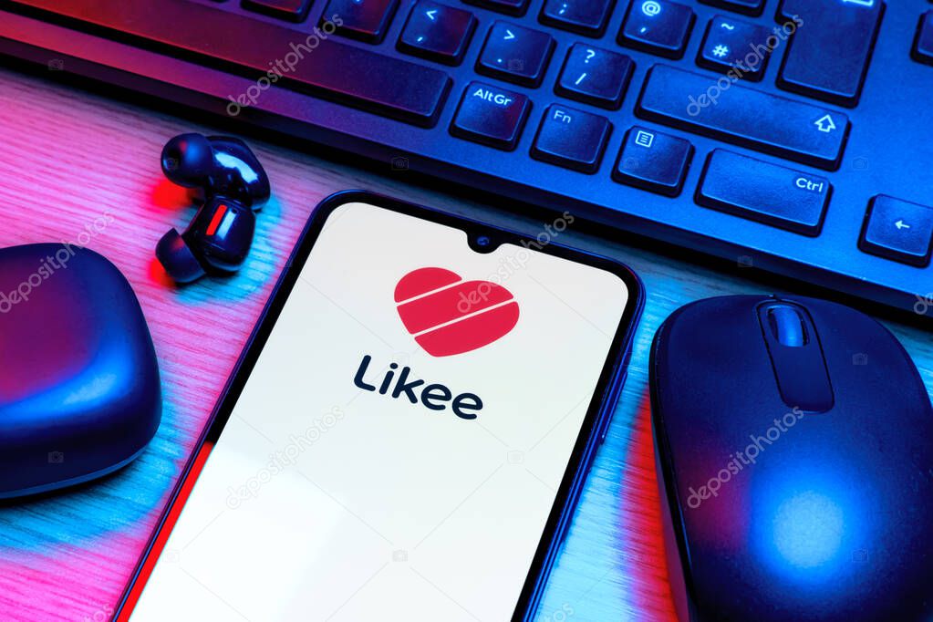 Prague, Czechia - 10 21 2024: Smartphone on surface showing Likee logo.