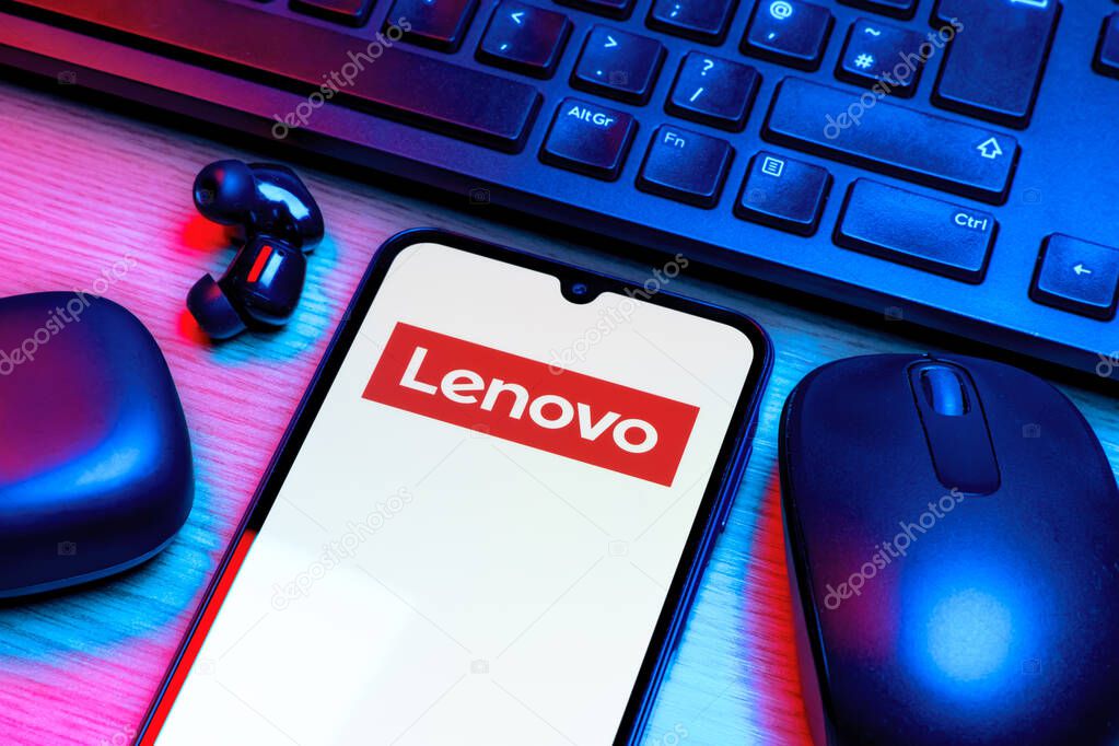 Prague, Czechia - 10 21 2024: Smartphone on surface showing Lenovo logo.