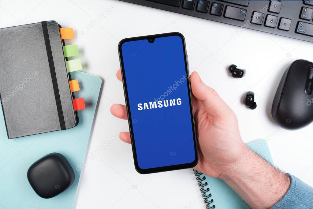 Prague, Czechia - 10 21 2024: Smartphone on surface showing Samsung logo.