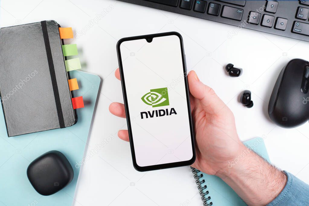 Prague, Czechia - 10 21 2024: Smartphone on surface showing NVIDIA logo.