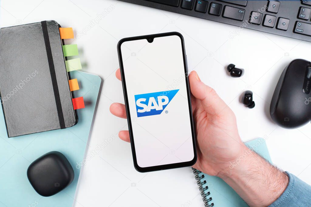 Prague, Czechia - 10 21 2024: Smartphone on surface showing SAP logo.