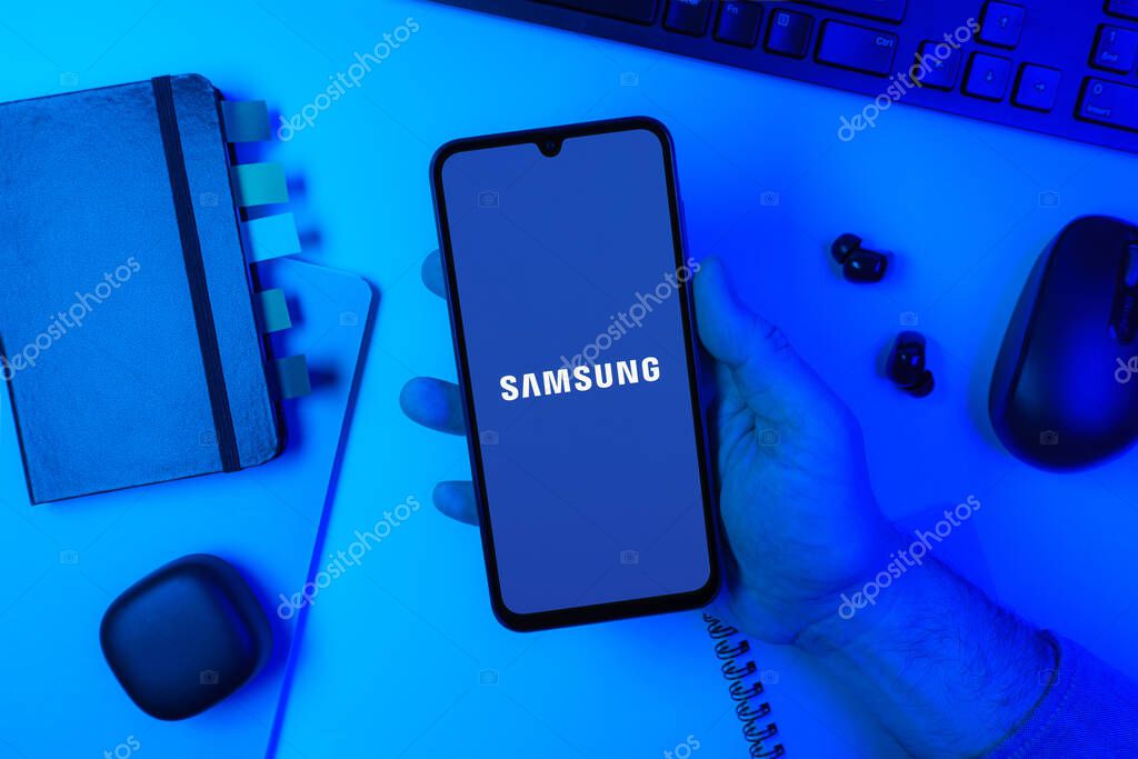 Prague, Czechia - 10 21 2024: Smartphone on surface showing Samsung logo.