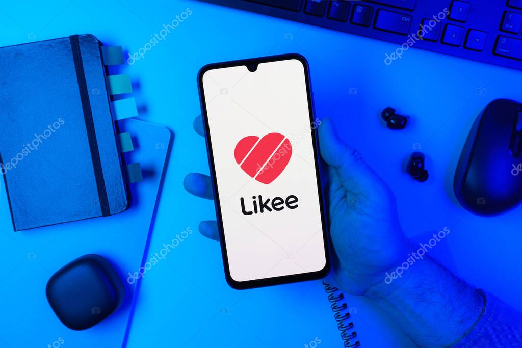 Prague, Czechia - 10 21 2024: Smartphone on surface showing Likee logo.