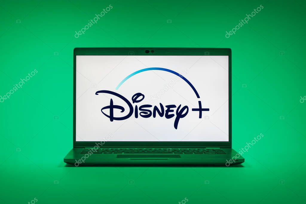 Prague, Czechia - 02 21 2025: Laptop on surface showing Disney + logo.