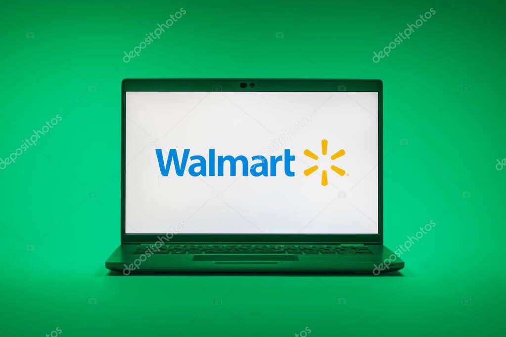 Prague, Czechia - 02 21 2025: Laptop on surface showing Walmart logo.