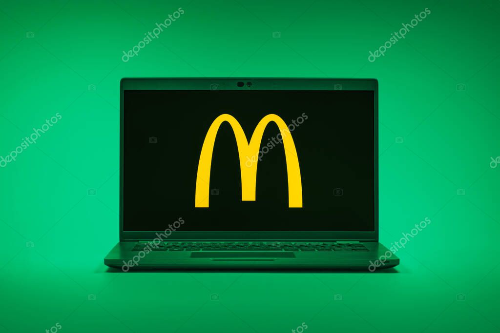 Prague, Czechia - 02 21 2025: Laptop on surface showing McDonalds logo.