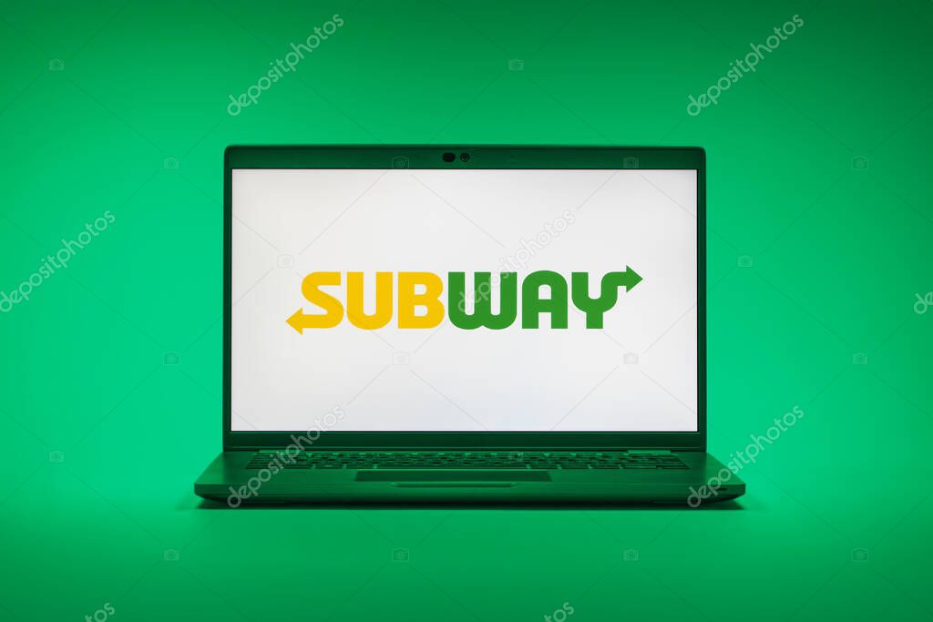 Prague, Czechia - 02 21 2025: Laptop on surface showing Subway logo.