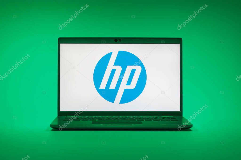Prague, Czechia - 02 21 2025: Laptop on surface showing Hewlett-Packard logo.