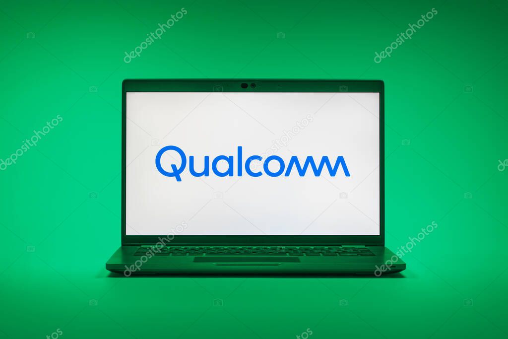 Prague, Czechia - 02 21 2025: Laptop on surface showing Qualcomm logo.