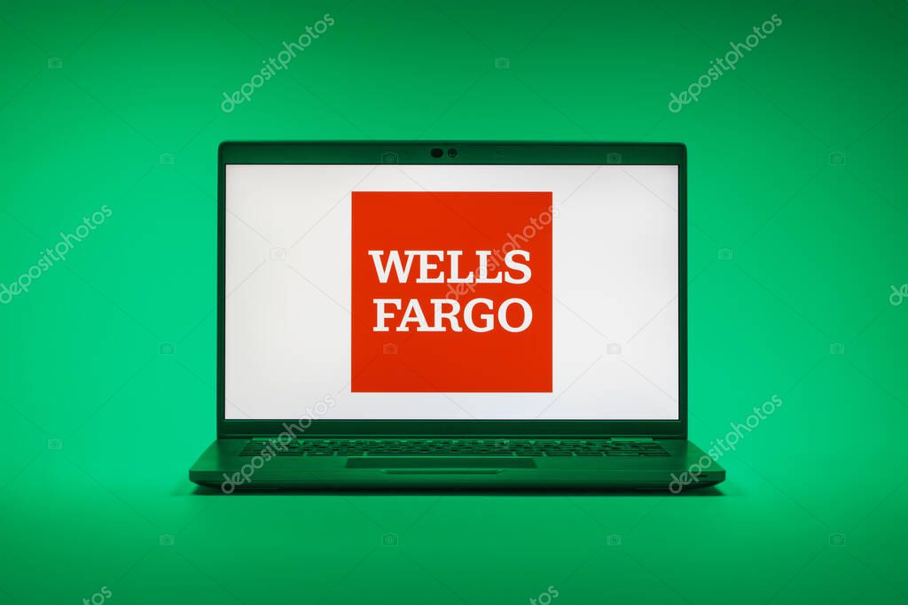 Prague, Czechia - 02 21 2025: Laptop on surface showing Wells Fargo logo.