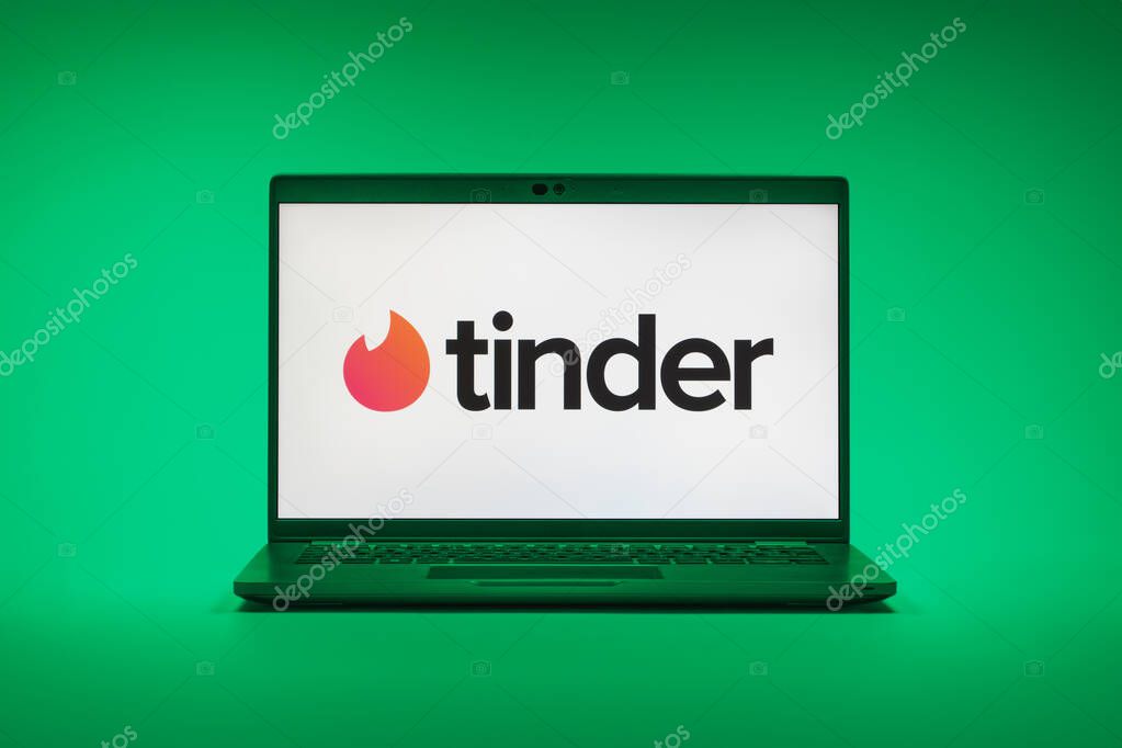 Prague, Czechia - 02 21 2025: Laptop on surface showing Tinder logo.