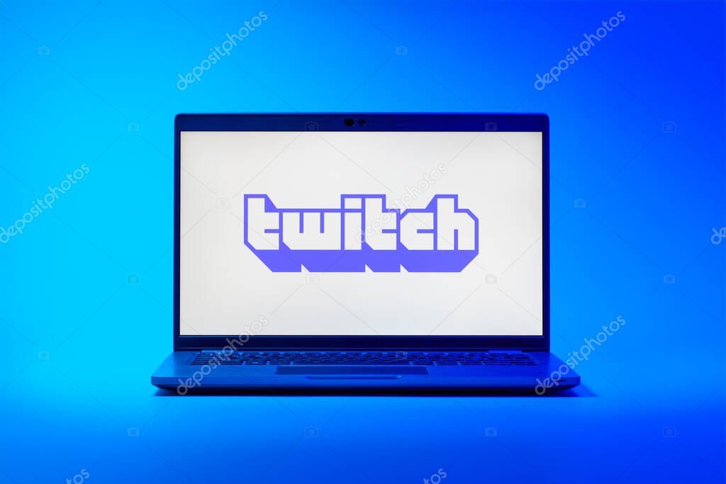 Prague, Czechia - 02 21 2025: Laptop on surface showing Twitch logo.