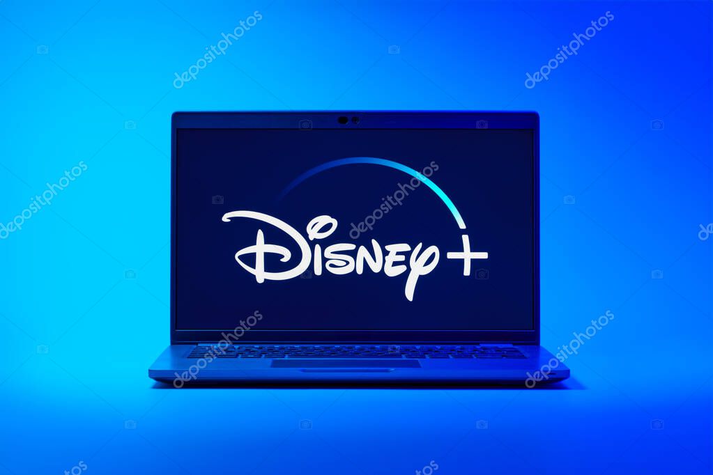 Prague, Czechia - 02 21 2025: Laptop on surface showing Disney + logo.