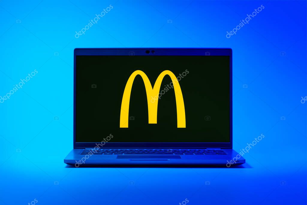 Prague, Czechia - 02 21 2025: Laptop on surface showing McDonalds logo.