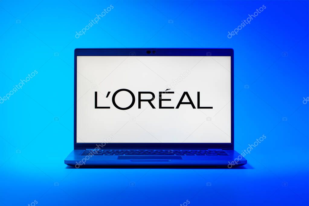 Prague, Czechia - 02 21 2025: Laptop on surface showing L'Oreal logo.