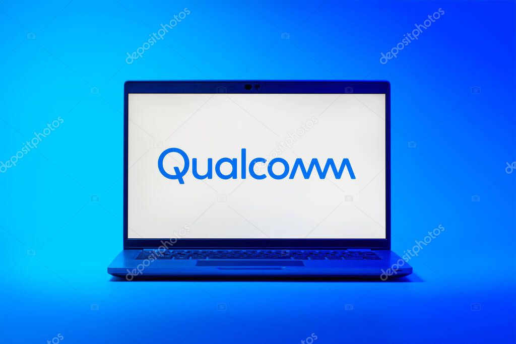 Prague, Czechia - 02 21 2025: Laptop on surface showing Qualcomm logo.