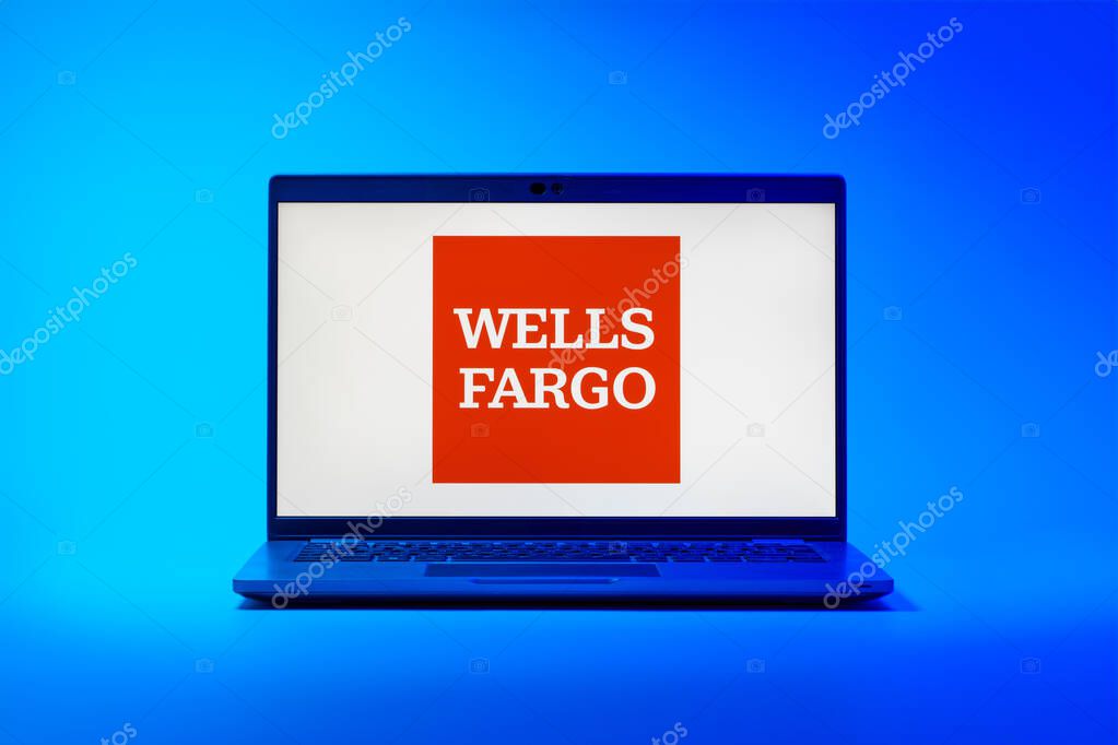 Prague, Czechia - 02 21 2025: Laptop on surface showing Wells Fargo logo.