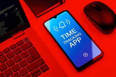Zaman İzleme Uygulaması kavramını ifade eden bir ofis masasında nesnelerin düzenlenmesi.
