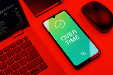 Fazla mesai kavramını ifade eden nesnelerin ofis masasında düzenlenmesi.