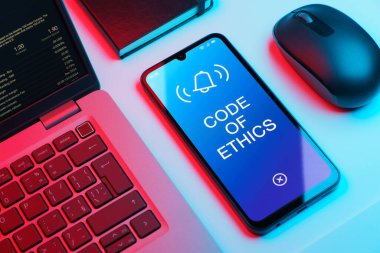 Ofis masasında ahlak kurallarını ifade eden nesnelerin düzenlenmesi.