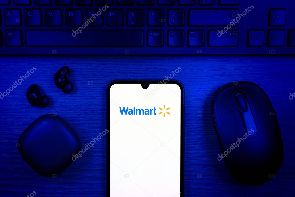 Prague, Czechia - 10 21 2024: Smartphone on surface showing Walmart logo.
