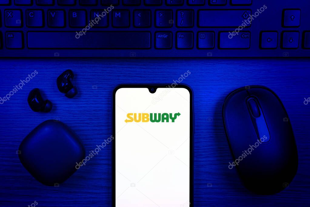 Prague, Czechia - 10 21 2024: Smartphone on surface showing Subway logo.