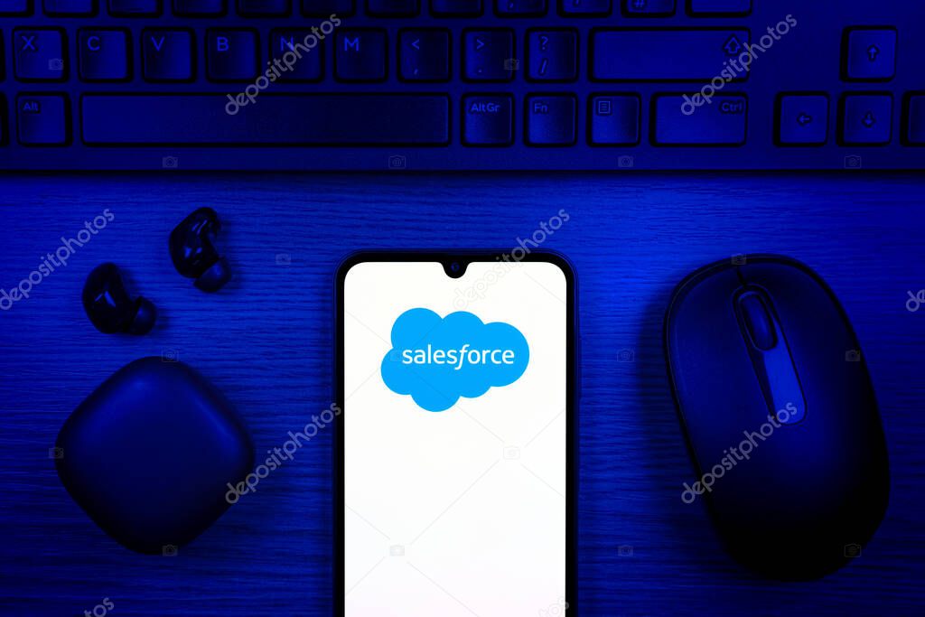 Prague, Czechia - 10 21 2024: Smartphone on surface showing Salesforce logo.