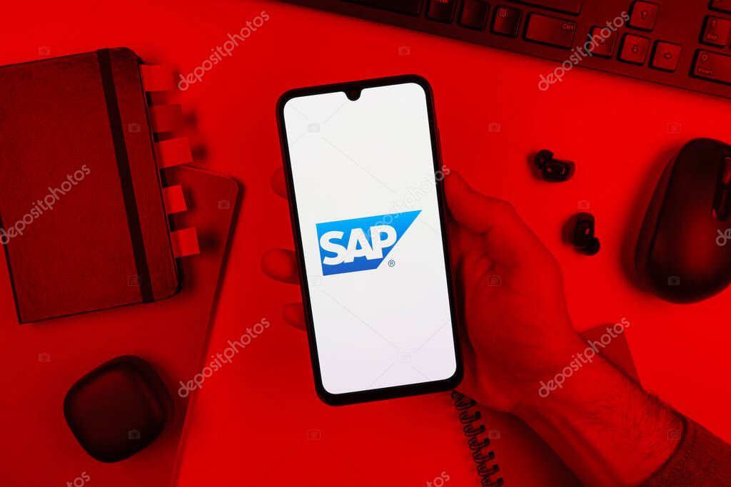 Prague, Czechia - 10 21 2024: Smartphone on surface showing SAP logo.