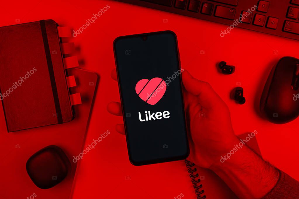 Prague, Czechia - 10 21 2024: Smartphone on surface showing Likee logo.