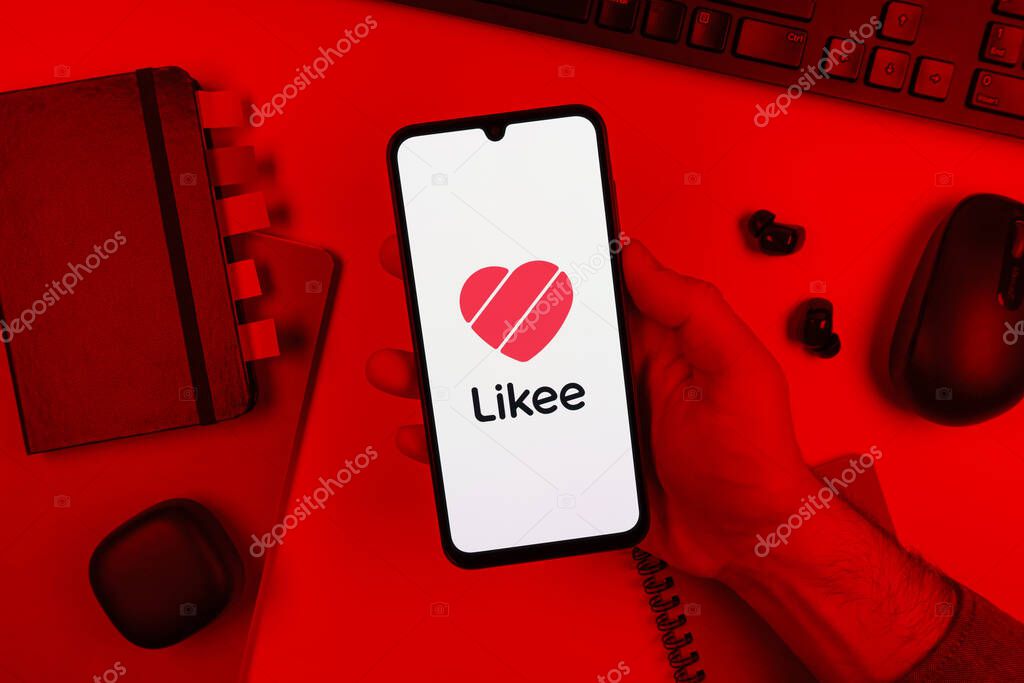Prague, Czechia - 10 21 2024: Smartphone on surface showing Likee logo.