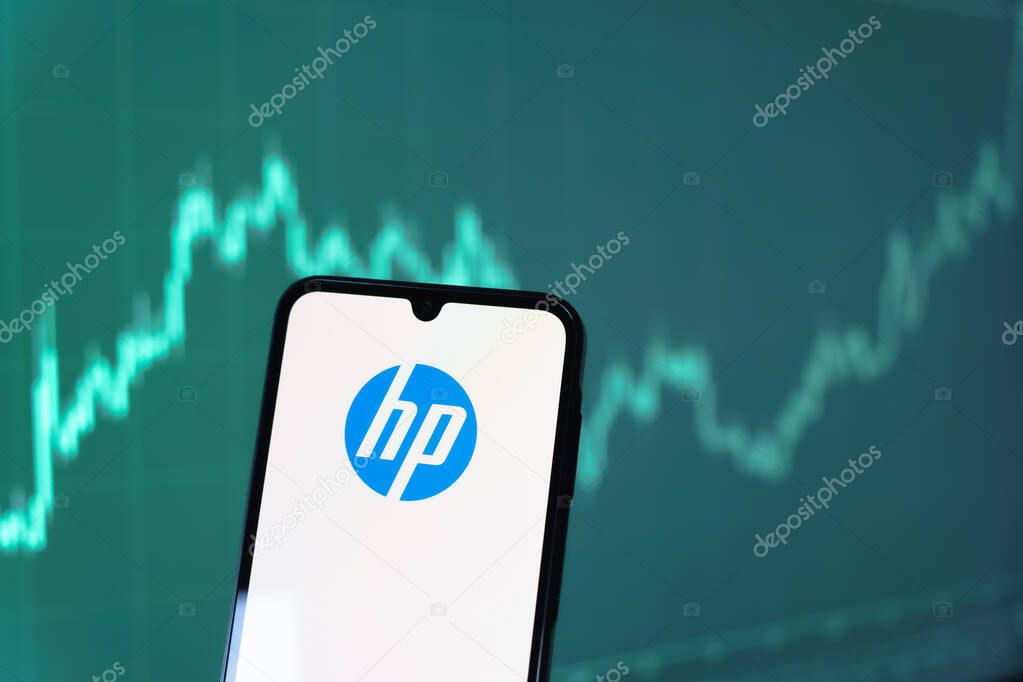 Prague, Czechia - 10 21 2024: Smartphone on surface showing Hewlett-Packard logo.