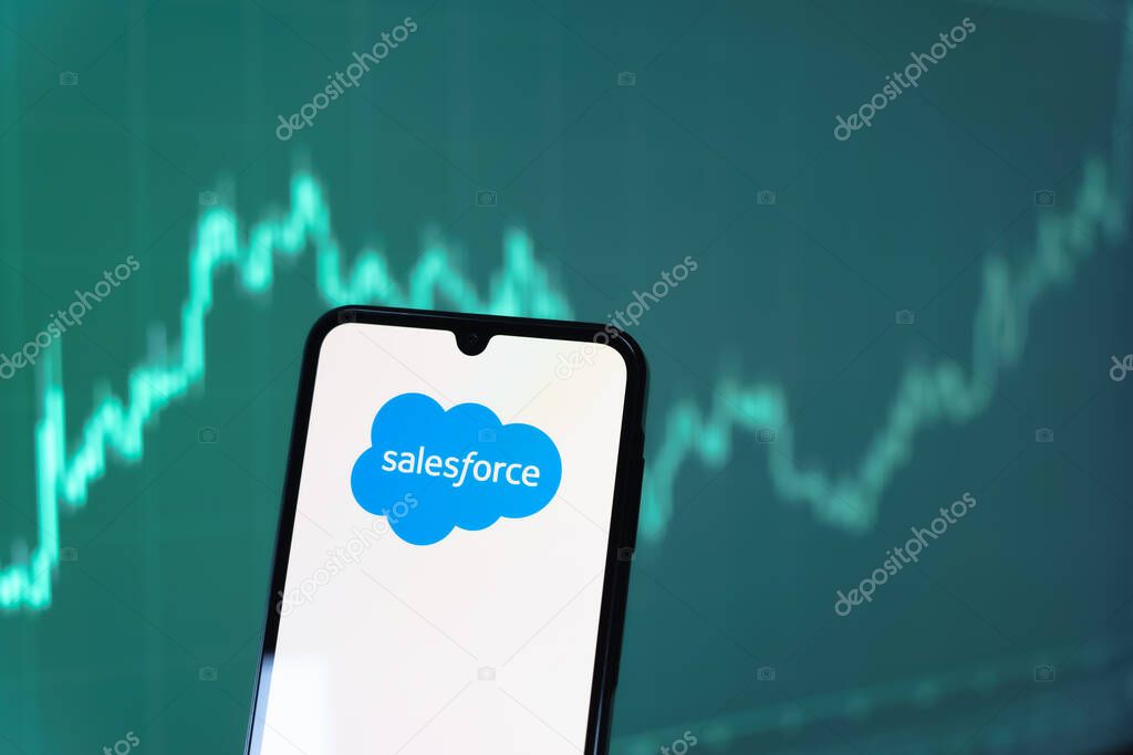 Prague, Czechia - 10 21 2024: Smartphone on surface showing Salesforce logo.