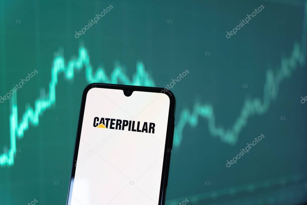 Prague, Czechia - 10 21 2024: Smartphone on surface showing Caterpillar logo.