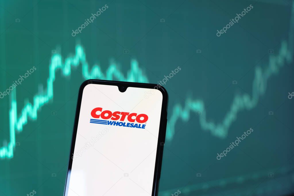 Prague, Czechia - 10 21 2024: Smartphone on surface showing Costco logo.