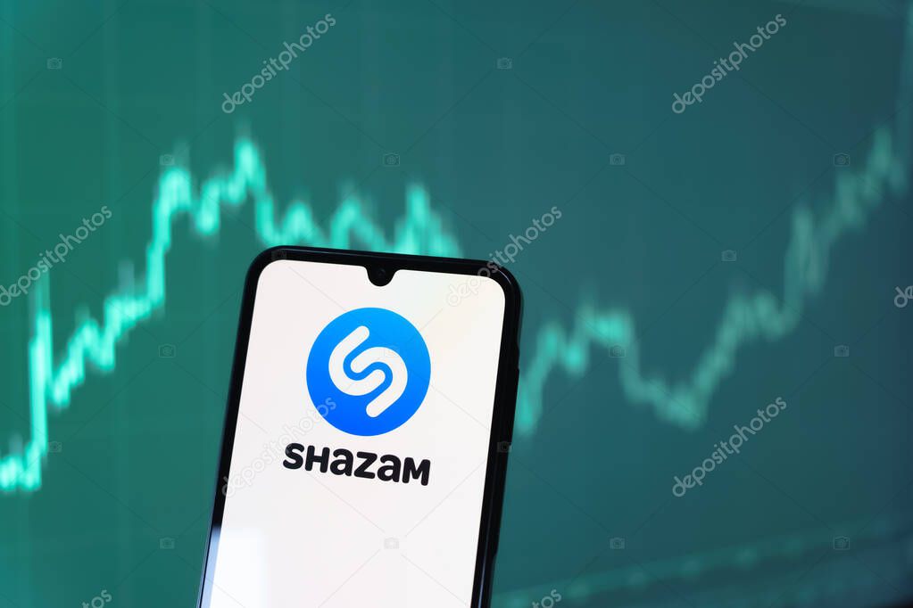 Prague, Czechia - 10 21 2024: Smartphone on surface showing Shazam logo.