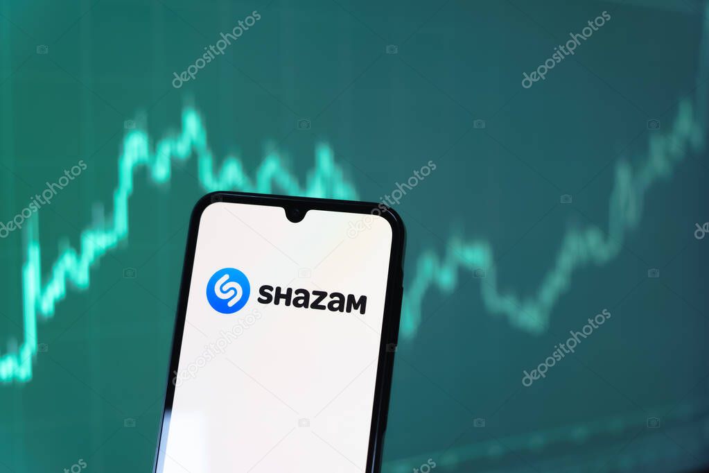 Prague, Czechia - 10 21 2024: Smartphone on surface showing Shazam logo.