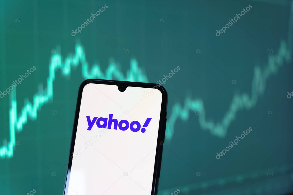 Prague, Czechia - 10 21 2024: Smartphone on surface showing Yahoo logo.
