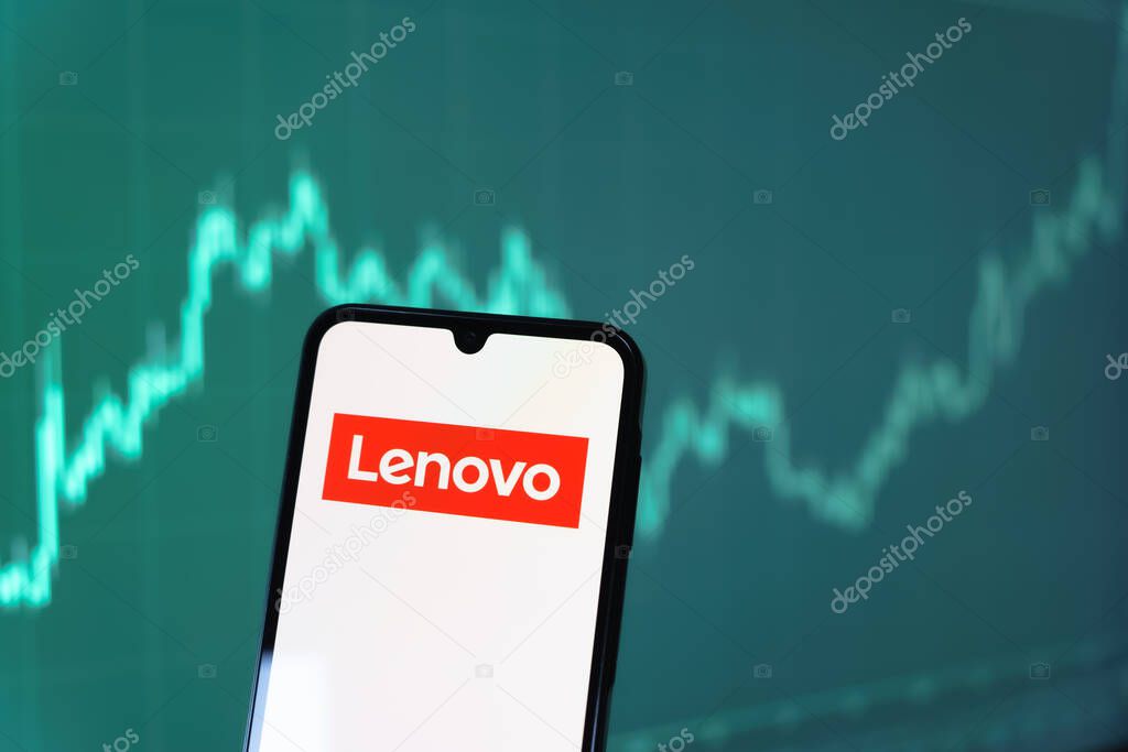 Prague, Czechia - 10 21 2024: Smartphone on surface showing Lenovo logo.