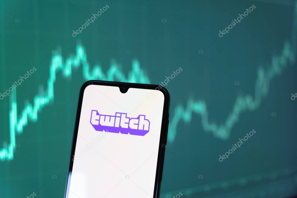 Prague, Czechia - 10 21 2024: Smartphone on surface showing Twitch logo.