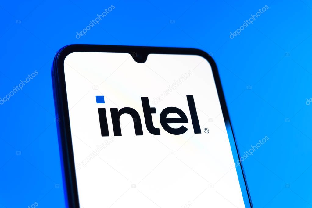 Prague, Czechia - 10 21 2024: Smartphone on surface showing Intel logo.