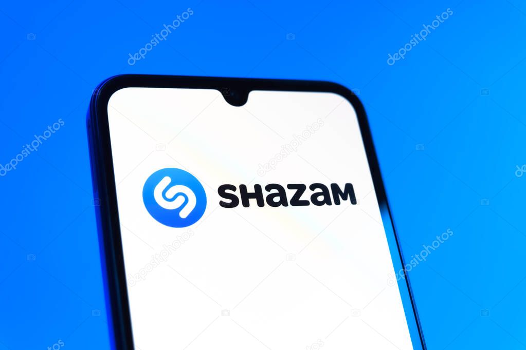 Prague, Czechia - 10 21 2024: Smartphone on surface showing Shazam logo.