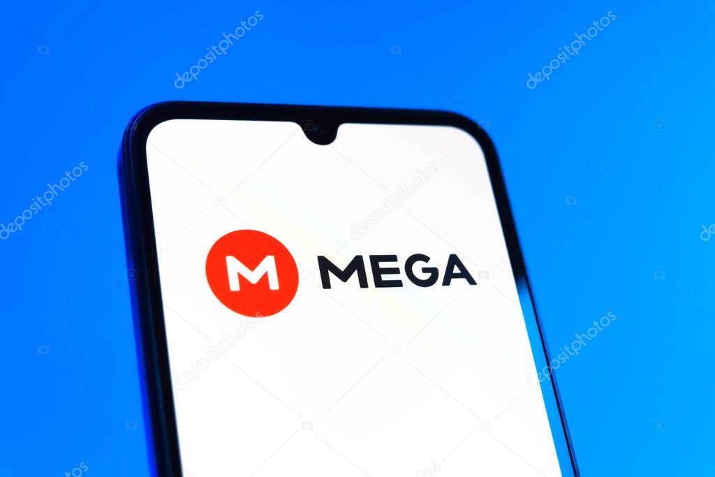 Prague, Czechia - 10 21 2024: Smartphone on surface showing Mega logo.