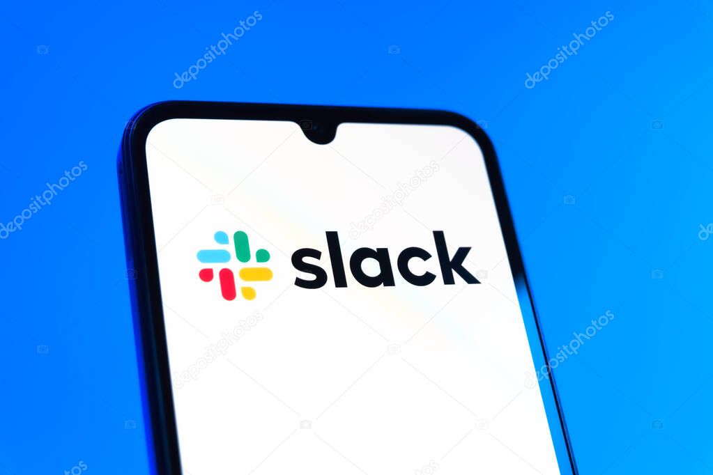 Prague, Czechia - 10 21 2024: Smartphone on surface showing Slack logo.