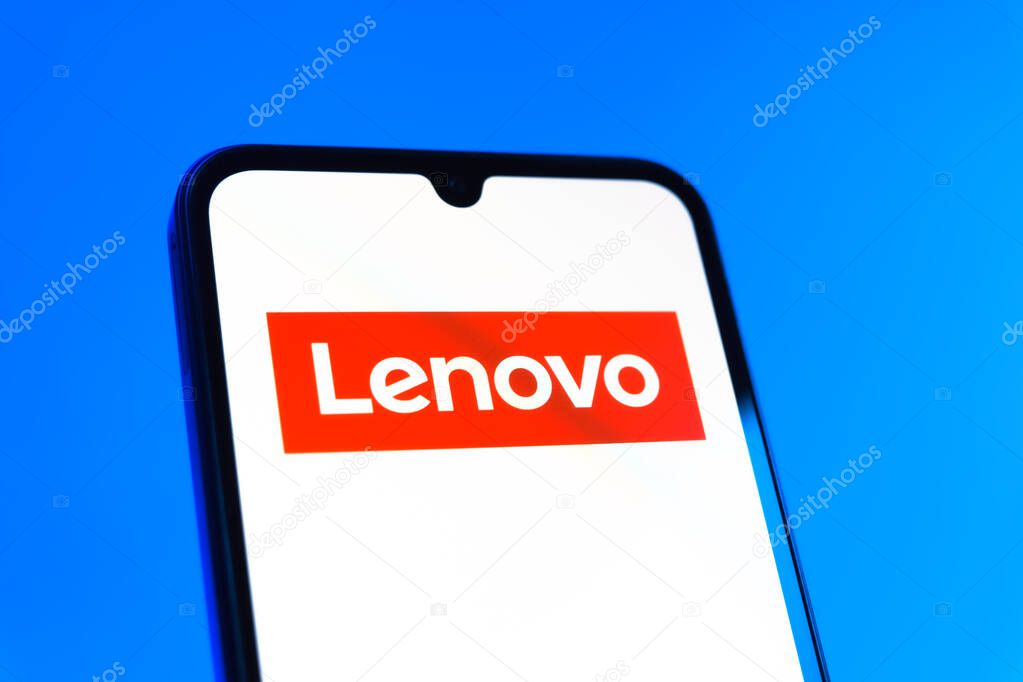 Prague, Czechia - 10 21 2024: Smartphone on surface showing Lenovo logo.