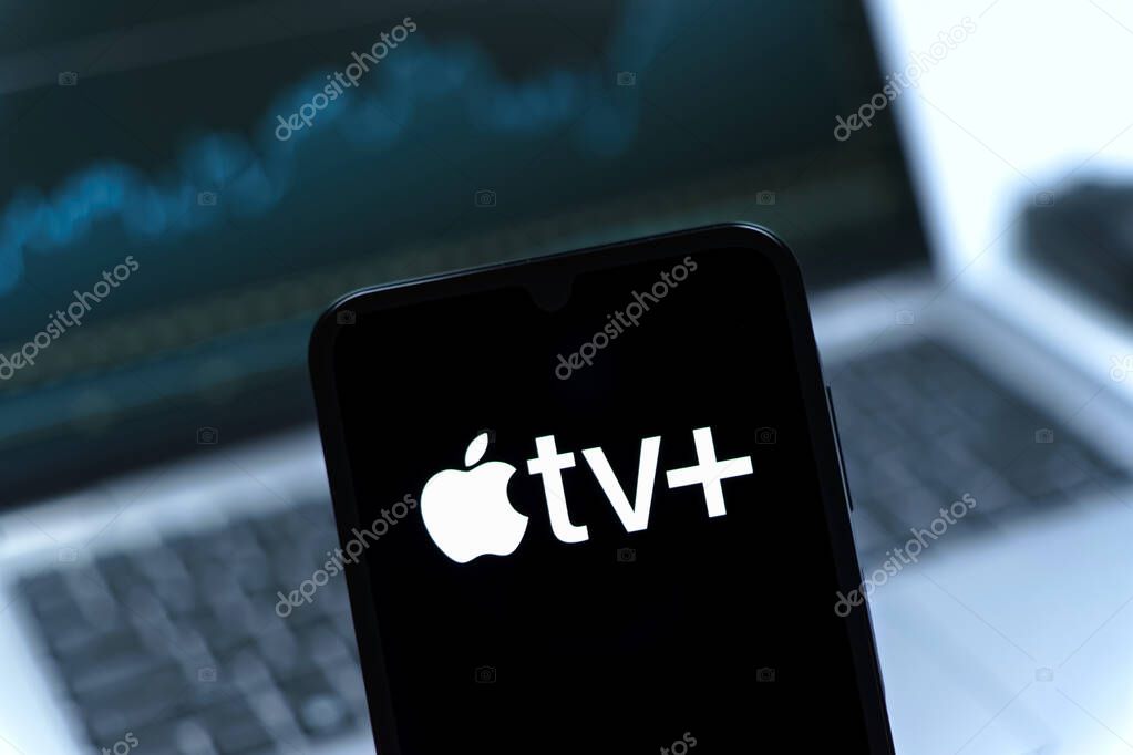Prague, Czechia - 05 08 2025: Smartphone on surface showing Apple TV+ logo.