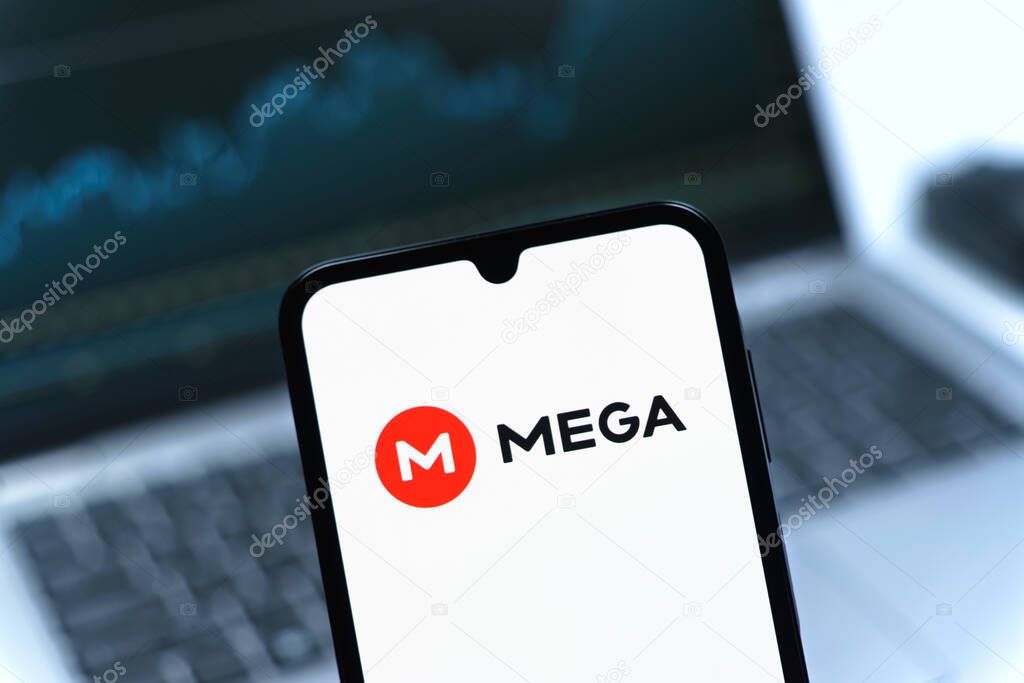 Prague, Czechia - 05 08 2025: Smartphone on surface showing Mega logo.